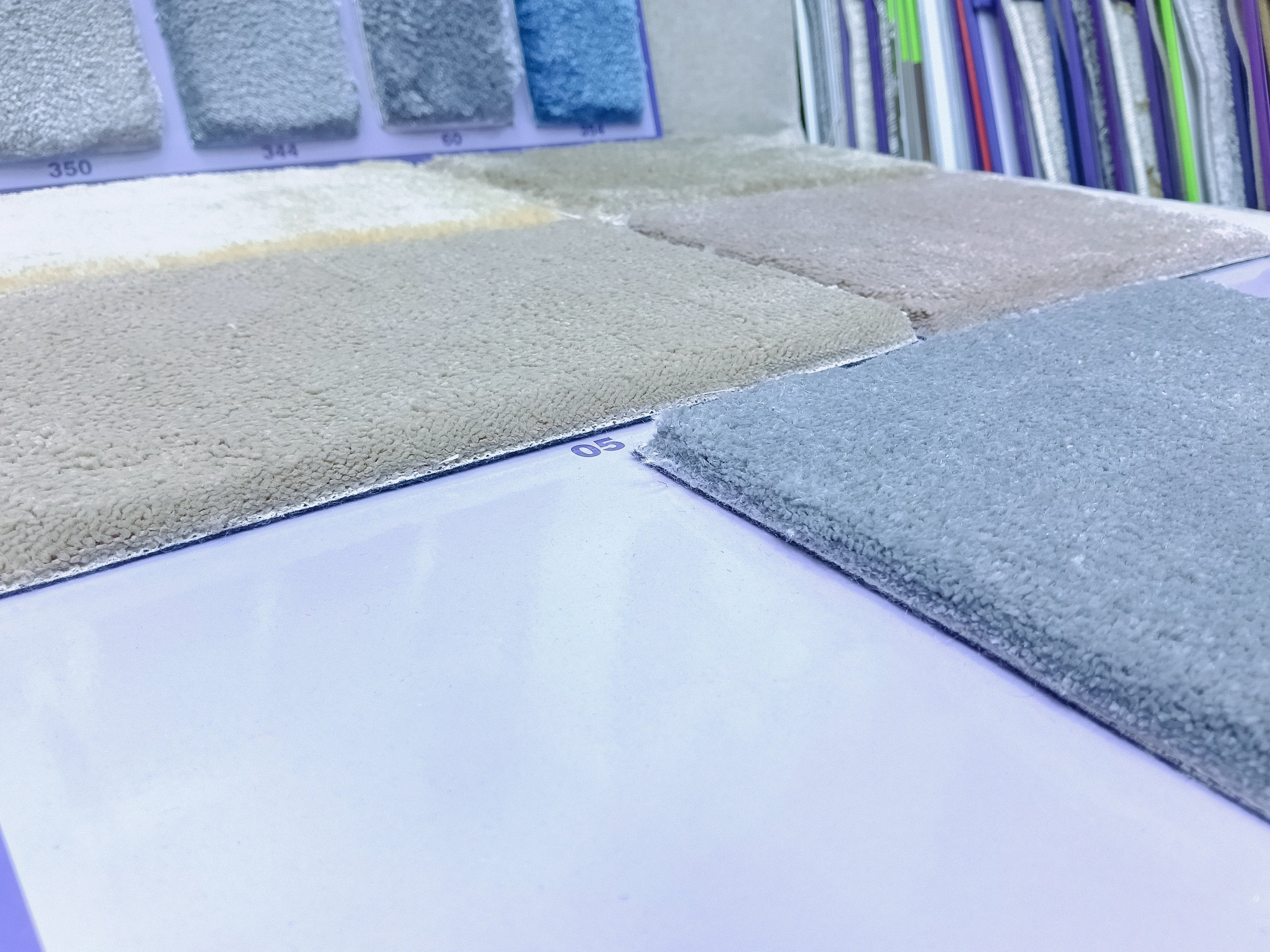 A thick and heavy rug with a plain design and durable quality.